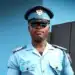 Testimonial from a man in blue police uniform with cap and sunglasses